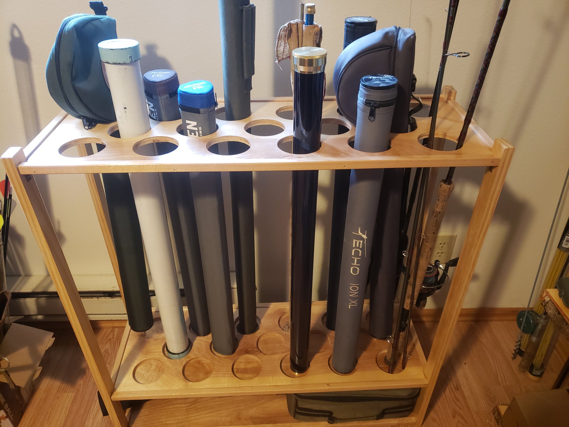 fly rod tube wall storage that looks super cool?